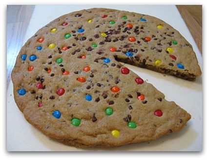 Logo Design Chocolate on Chocolate Chip Cookie Cake Baked In A Pizza Pan