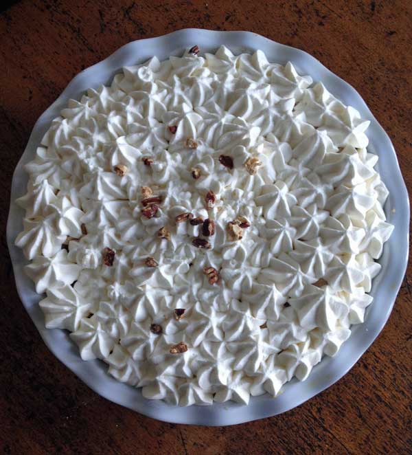 butternut brownie pie with sweetened whipped cream.