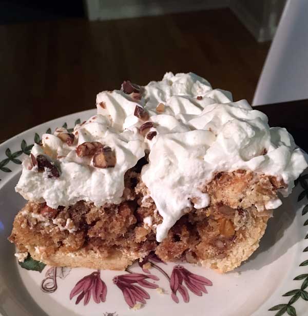 butternut brownie pie showing the pecan meringue filling