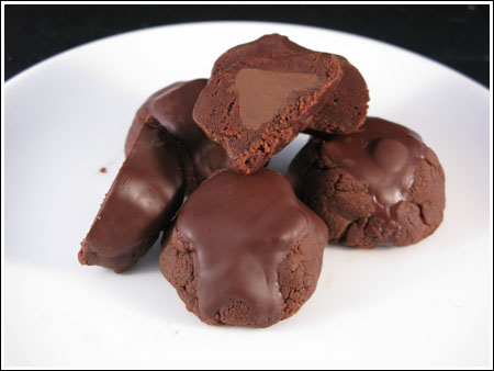Inside Out Brownie Cookies made with a can of condensed milk, chocolate chips, butter and Hershey's Kisses.