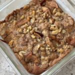 Easy Apple Streusel Coffee Cake recipe for an apple cake baked in an 8-inch square glass dish.