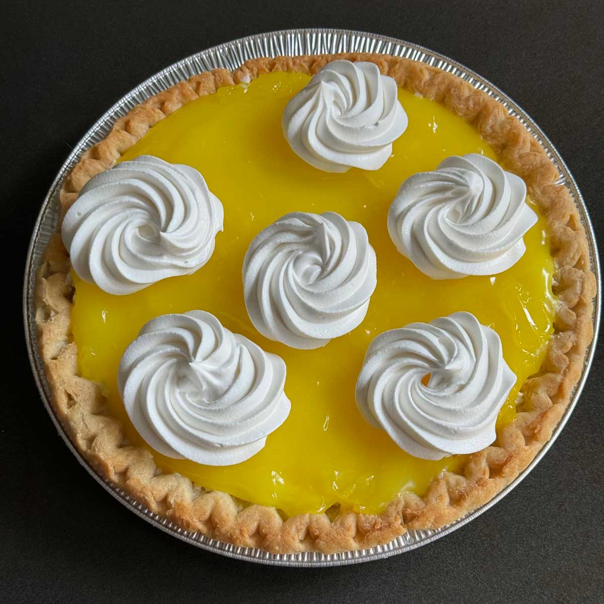 Copycat recipe for Lemon Supreme Pie like Baker's Square. Topping has no eggs.