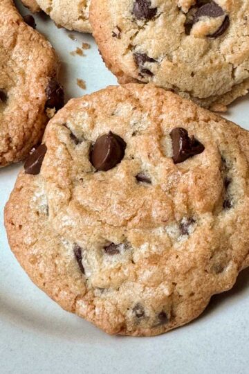 Crunchy chocolate chip cookies with a shiny, glossy, finish