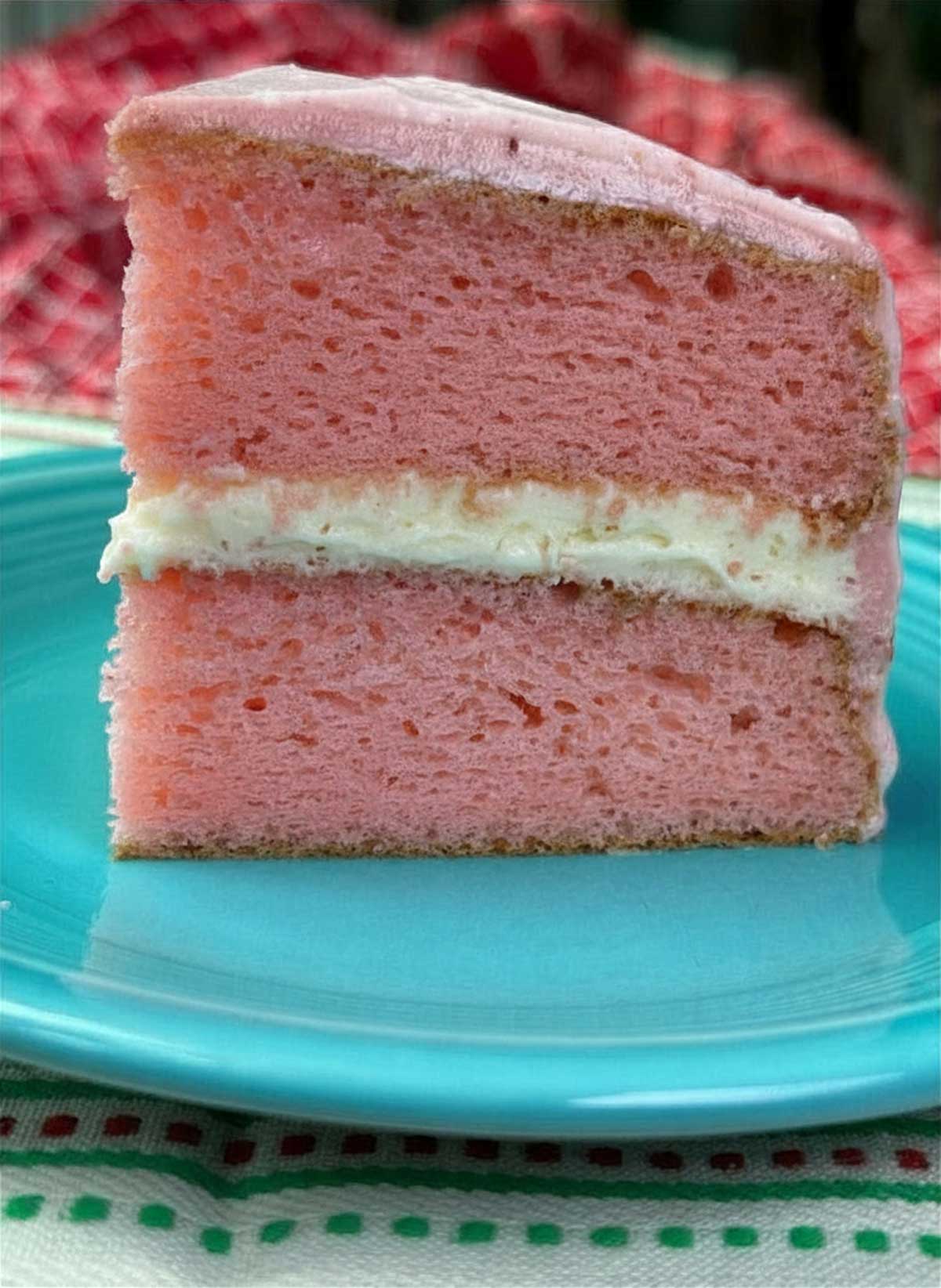 6-inch strawberry layer cake made with cake mix and freeze dried strawberry cream cheese frosting.