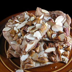 Almond Butterscotch Bars piled high on a plate to show what the recipe looks like.