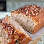 Cream Cheese Banana Bread recipe that call for cream cheese in the batter, sliced to show texture.