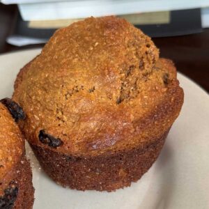 A classic bran muffin made with coarse wheat bran, molasses, brown sugar and oil with a high top.
