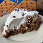 Slice of Graham Cracker Surprise Pie from an old recipe calling for pecans and 3 egg whites.