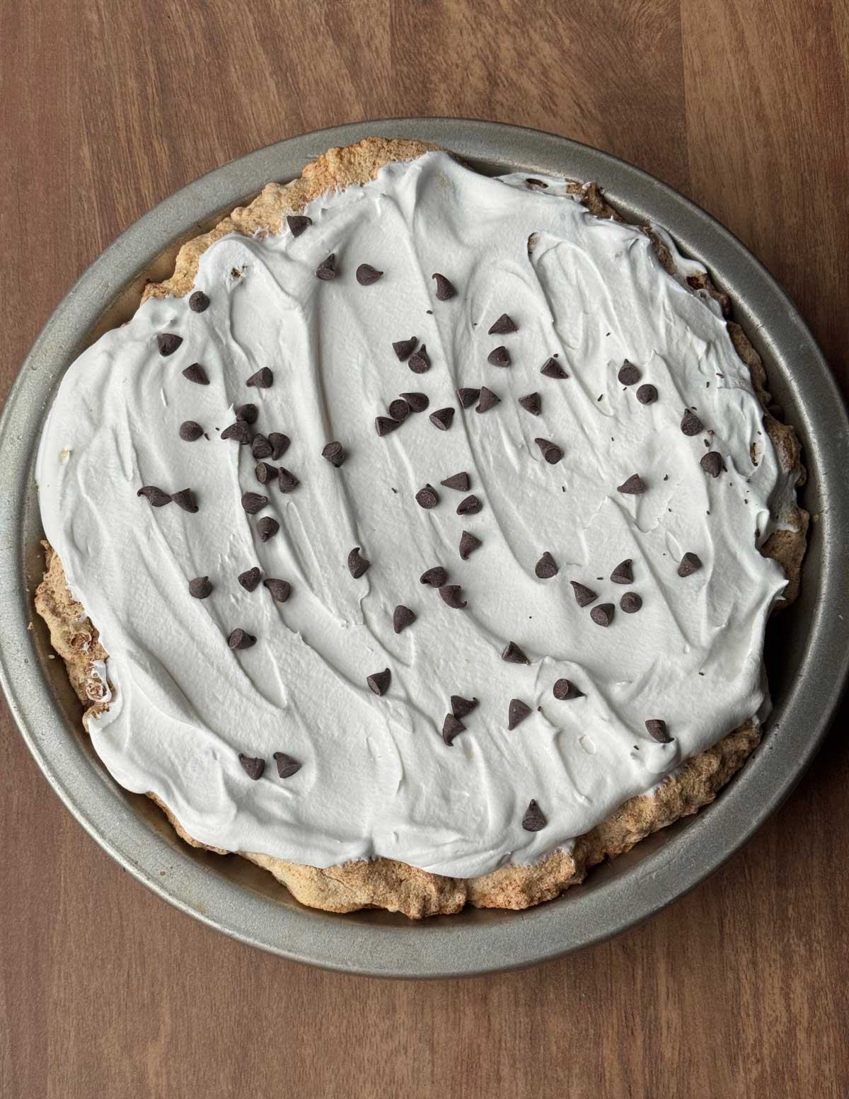Slice of Graham Cracker Surprise Pie from an old recipe calling for pecans and 3 egg whites.