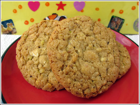pistachio-white-chocolate-cookies White chocolate pistachio cookies made with ground pistachio nuts, oats, Corn Flakes and coconut.