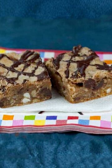 Katy's Favorite Blondies is an easy blondie recipe that calls for melted butter, lots of chocolate and walnuts.