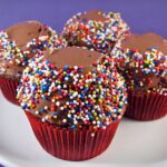Chocolate Sour Cream Cupcakes with domed tops and a bittersweet chocolate sour cream frosting recipe.