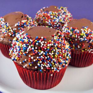 Chocolate Sour Cream Cupcakes with domed tops and a bittersweet chocolate sour cream frosting recipe.