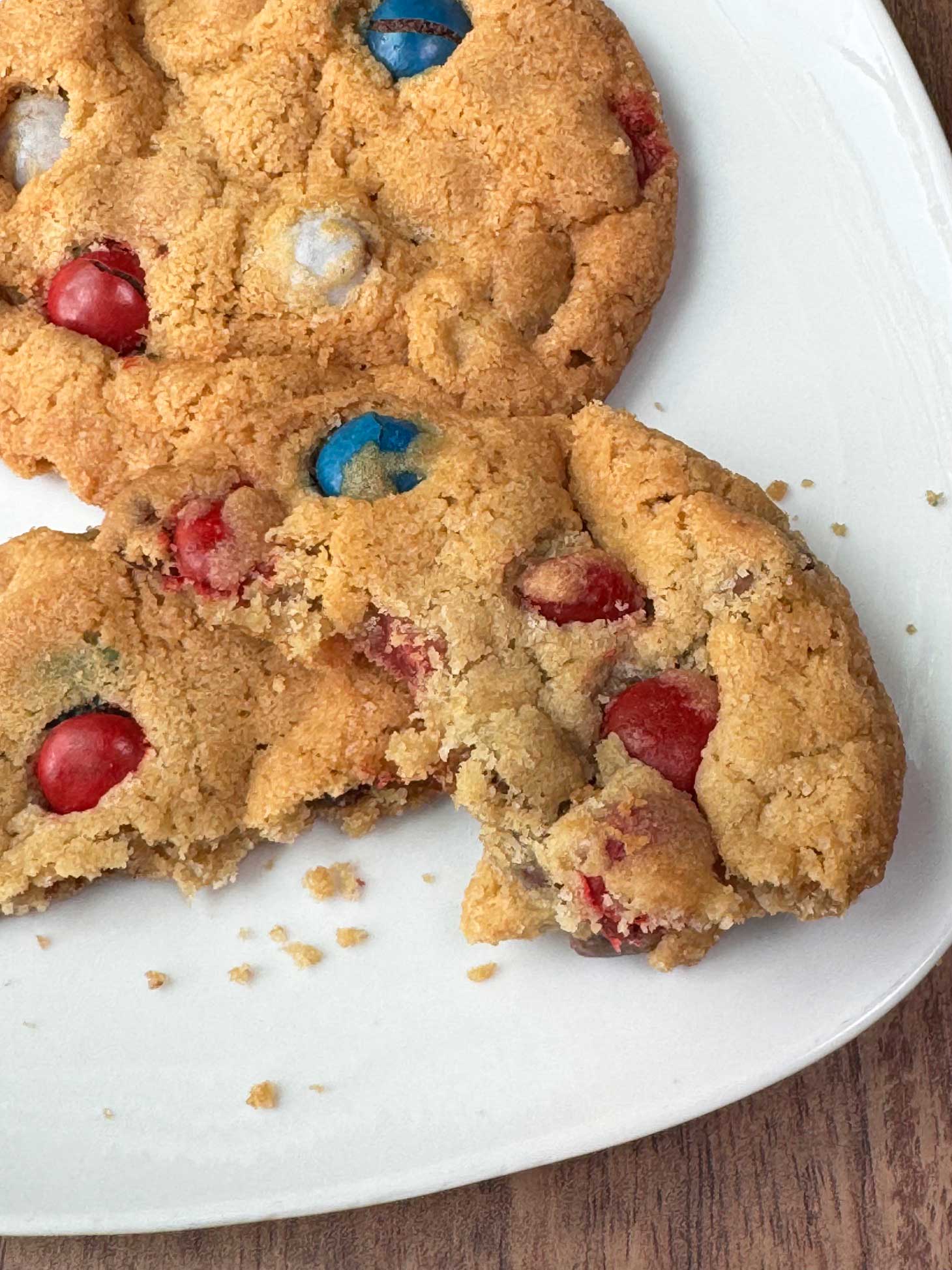 M&Ms Cookies with crispy edges and soft centers like bakery cookies.