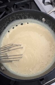 Stir until thick and big bubbles break the surface.
