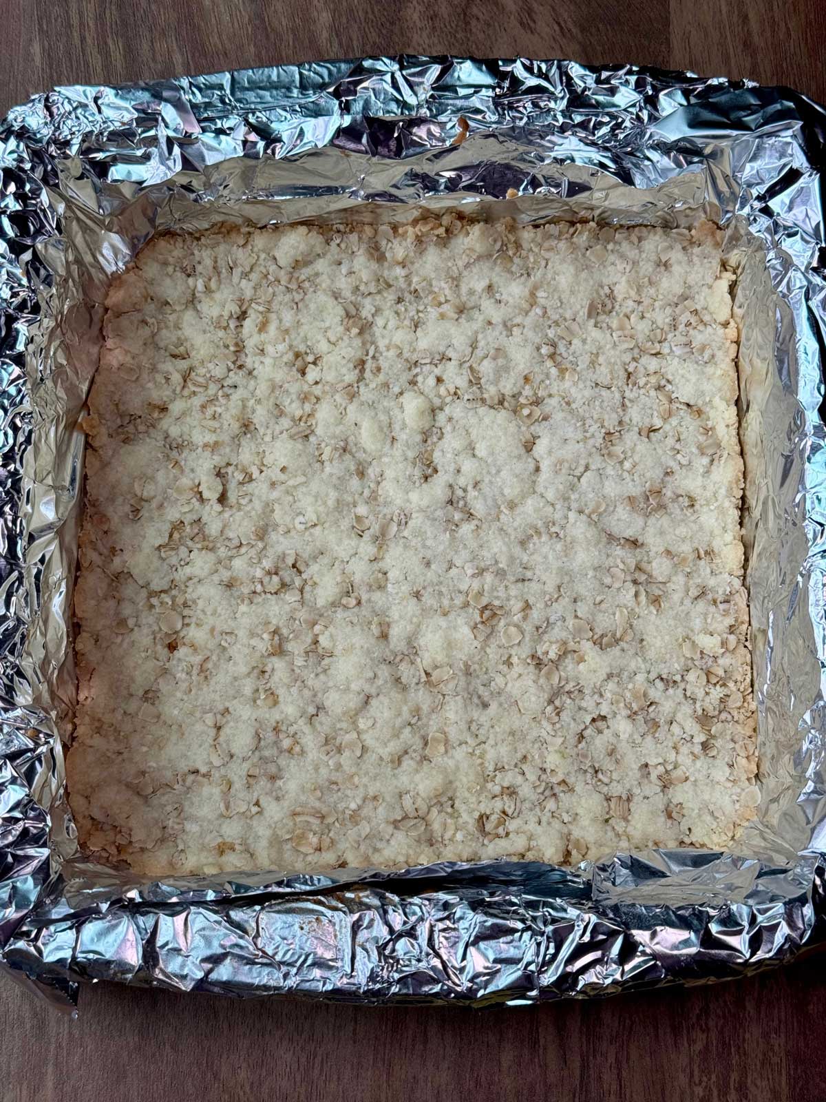 Partially baked maple pecan bars crust.