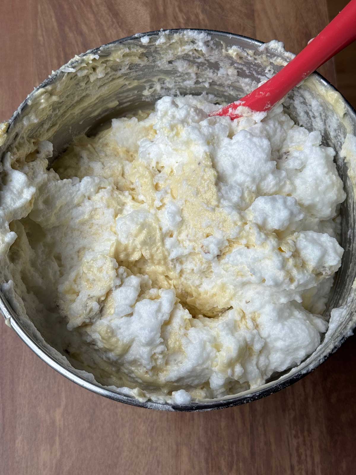 Egg whites being folded into Italian Cream Cake batter