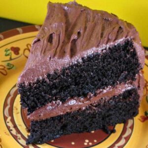 Melissa's Chocolate Cake slice -- two layers of 8-inch chocolate cake with a creamy frosting.