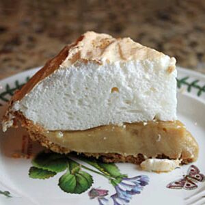 Small butterscotch pie slice from a pie baked in a 7-inch pie dish.