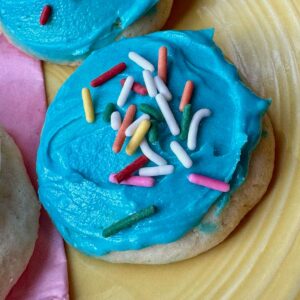 Amish Sugar Cookies with blue frosting and sprinkles.