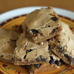 Recipe for meringue topped bar cookies known as Peanut Butter Mud Hens.