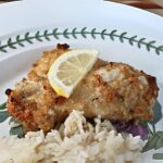 Chicken breast marinated in spiced Greek yogurt and breaded with panko or bread crumbs.