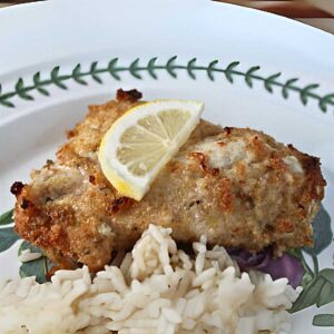 Chicken breast marinated in spiced Greek yogurt and breaded with panko or bread crumbs.