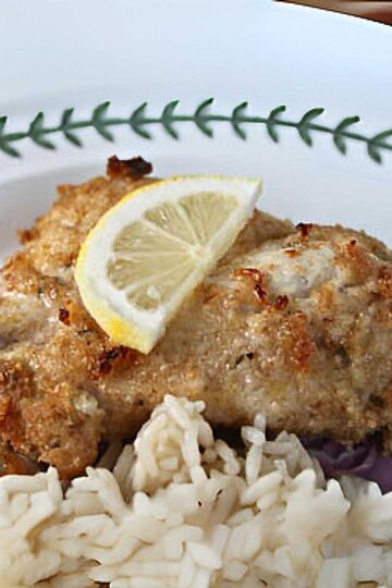 Chicken breast marinated in spiced Greek yogurt and breaded with panko or bread crumbs.