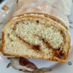 Slice of cinnamon swirl bread or cinnamon swirl loaves like the ones from school lunchrooms.