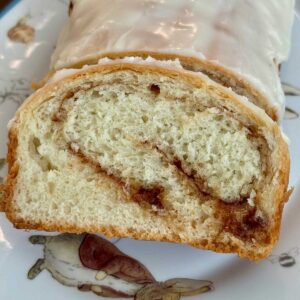 Slice of cinnamon swirl bread or cinnamon swirl loaves like the ones from school lunchrooms.