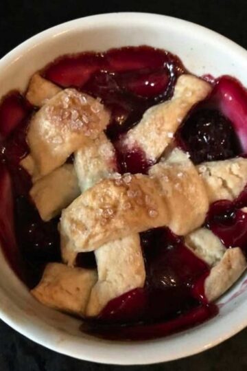 Mini Blackberry Cobbler recipe baked in small ramekins.