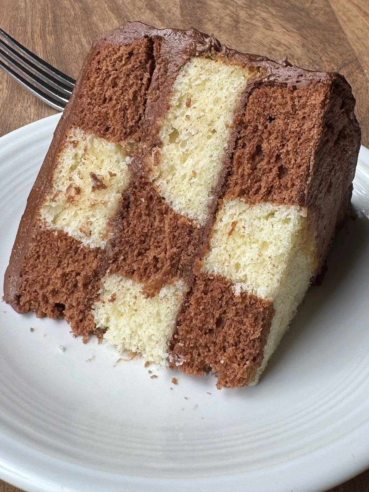 IMG_8085 Chocolate Frosted Checkerboard Cake with the recipe from the back of the Ghirardelli cocoa bag.