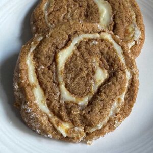 Cheesecake Ginger Cookies are soft, spicy cookies with a pinwheel of cream cheese.
