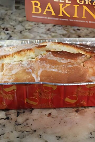 Recipe for a small vanilla pound cake made with whole wheat pastry flour and bread flour and a baked on glaze.