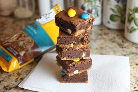 brownieswithcrust macadamia white chocolate chunk cookie dough with brownies on top. Aka, Brookies!