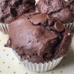 Recipe for Chocolate Apple Butter Muffins with high crowns.