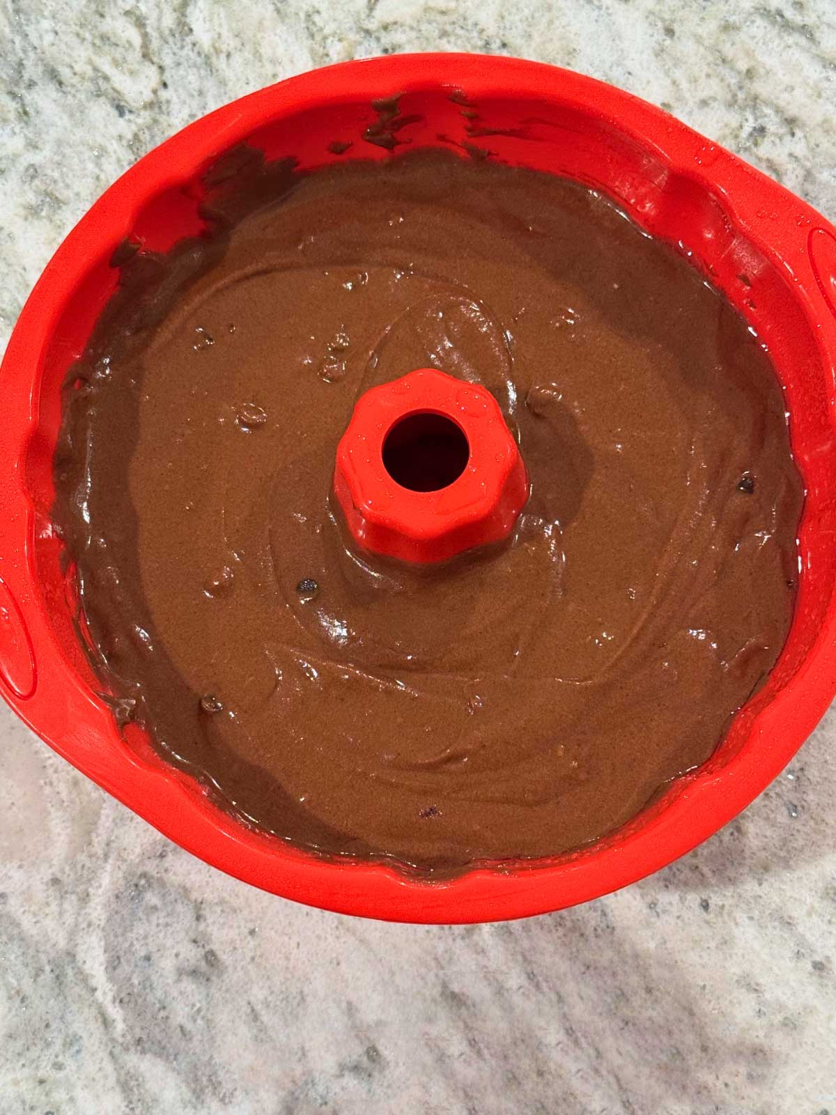 Small bourbon chocolate cake in a silicone bundt pan