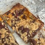 Oatmeal Seven Layer Bars with an easy crust made of oat flour, flour, brown sugar, butter and salt. Great for when you are out of graham crackers.