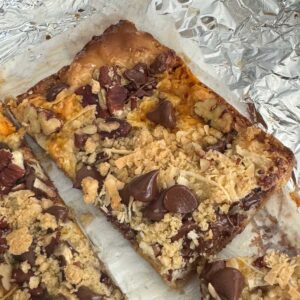 Oatmeal Seven Layer Bars with an easy crust made of oat flour, flour, brown sugar, butter and salt. Great for when you are out of graham crackers.