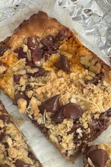 Oatmeal Seven Layer Bars with an easy crust made of oat flour, flour, brown sugar, butter and salt. Great for when you are out of graham crackers.