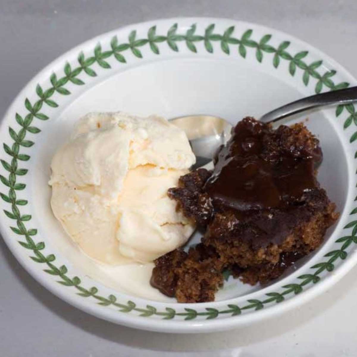 No-Egg Slow Cooker Chocolate Pudding Cake served with a scoop of vanilla ice cream.