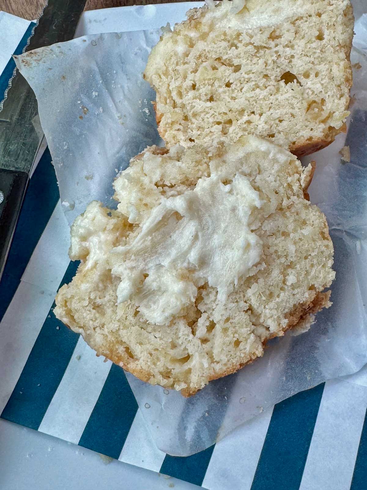 Pineapple Cream Cheese Muffin split to show filling.