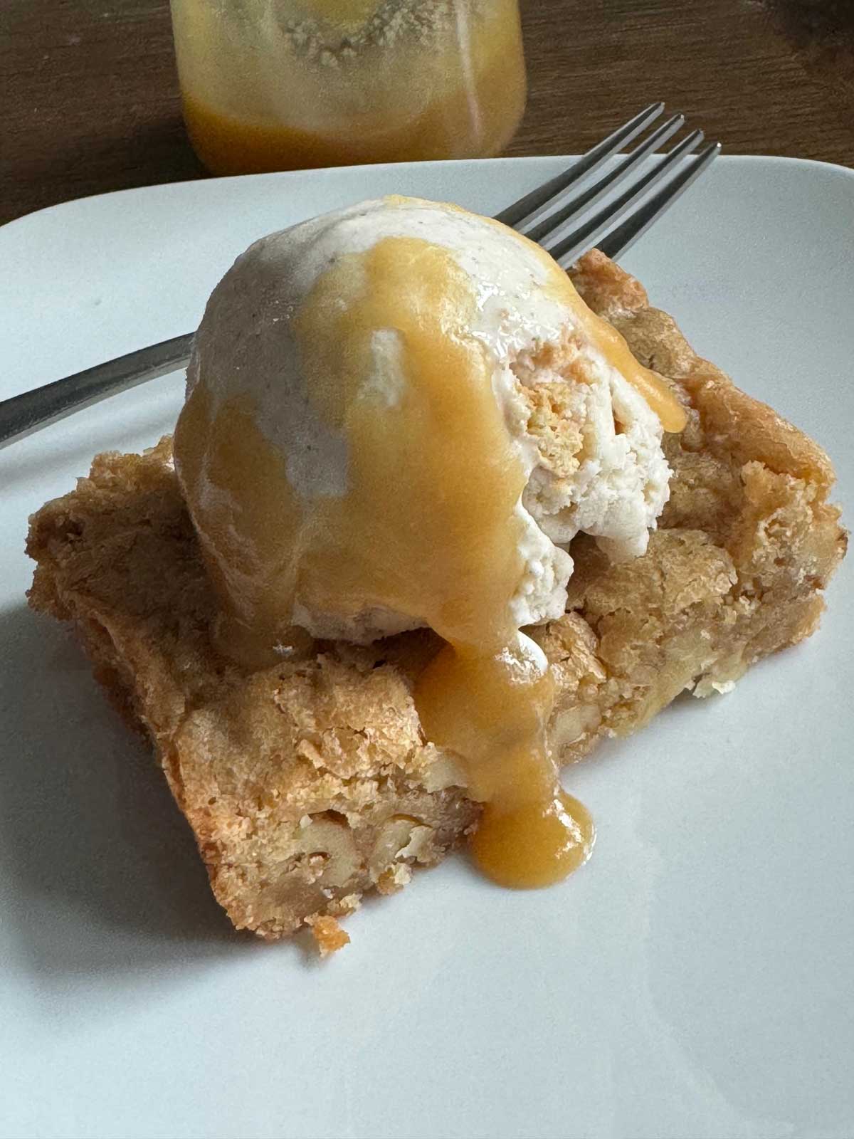 A very soft blondie topped with ice cream and maple-butter sauce.