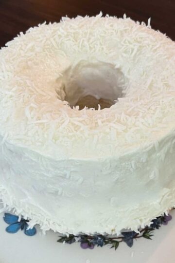 Angel Cake or Cloud Cake baked in a removable bottom tube pan.