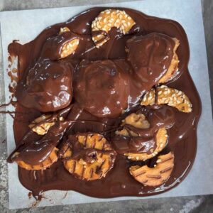 Peanut Butter Pretzel Bark made with allulose sweetened chocolate and protein pretzels.