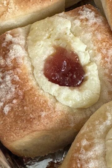 Authentic Texas style kolaches made with potato flakes, a cream cheese filling and preserves.