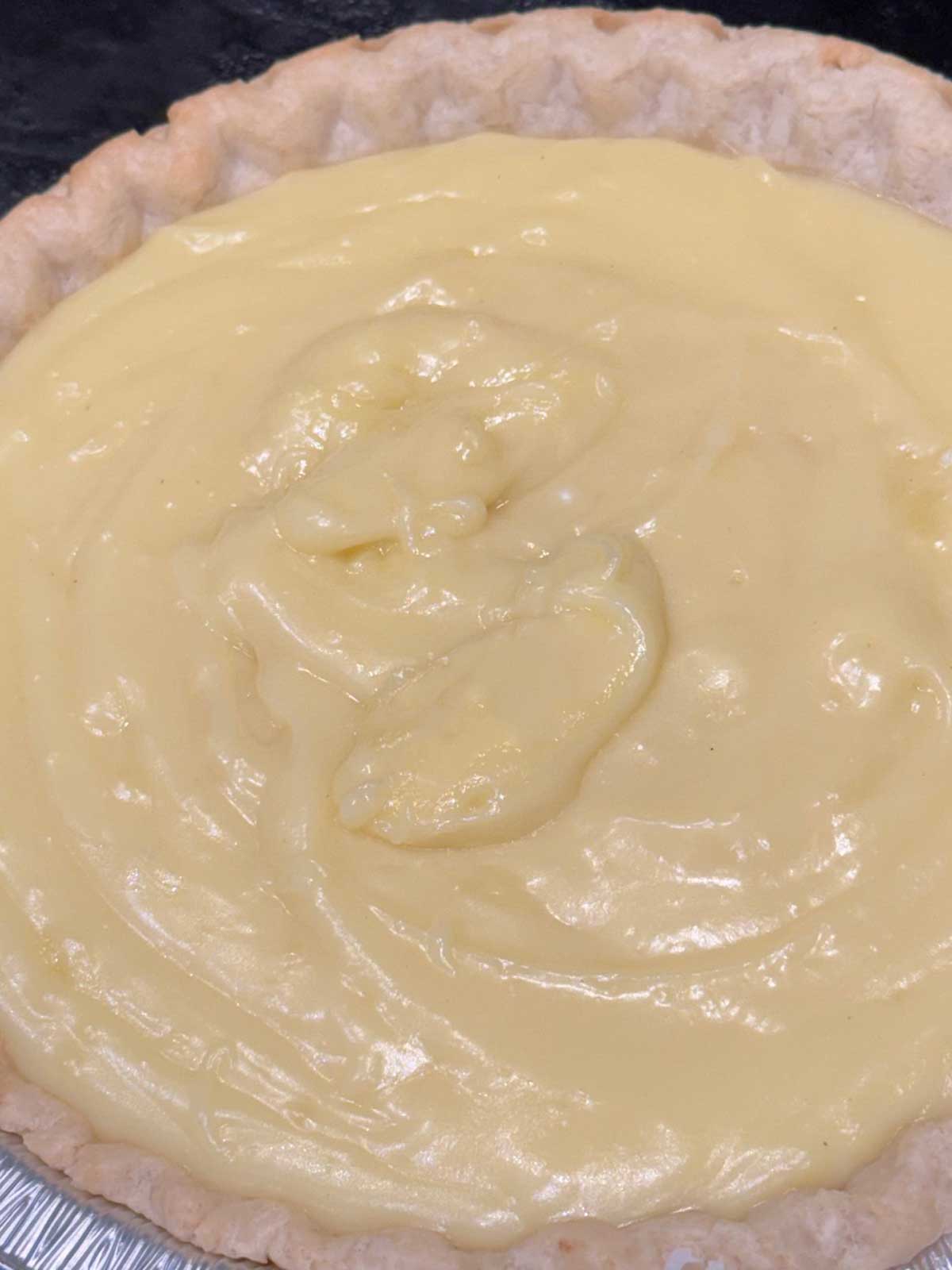 Boiling water makes coconut cream pie filling smooth and creamy.