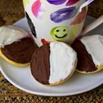 Recipe for Half Moon Cookies, a type of Black and White Cookie famous in Upstate New York delis.