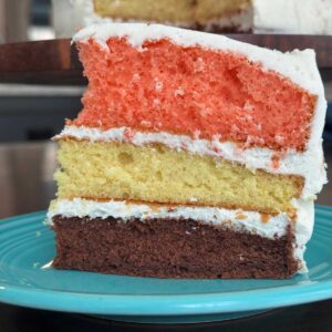 A Neapolitan layer cake made with one box of yellow cake mix.