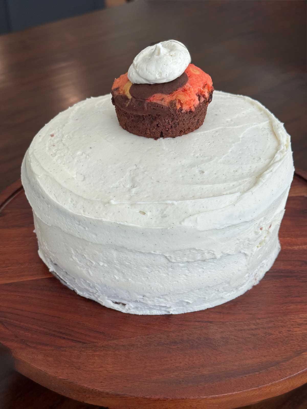 A cake frosted with fluffy American style buttercream.